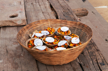 Flowers and candle for Ganga Aarti ritual