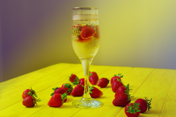 glass of champagne with strawberries