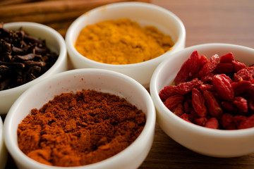 Wooden table of colorful spices