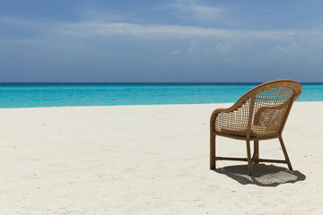 Fototapeta na wymiar empty beach chair