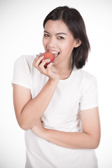 Smiling woman with apple isolated on white