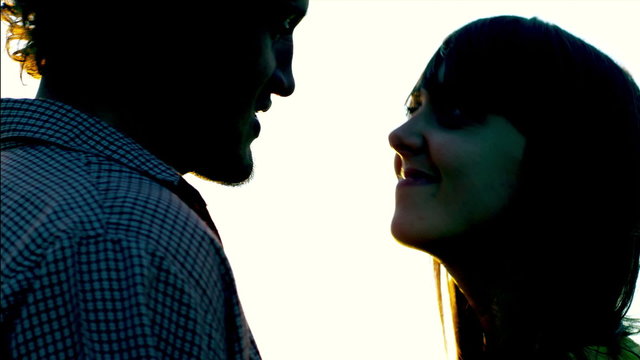 Beautiful Young Couple in Love Stare at each other the Run after one another
