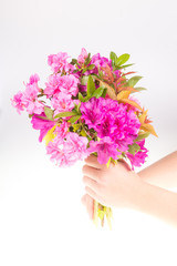 Child giving flower on a mothers day