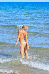  woman having fun in the sea