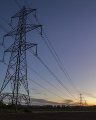 eletrical pylons at sunset
