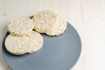 rice cake, puffed rice on table 
