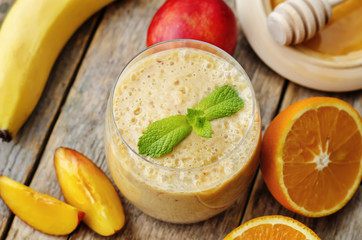 smoothies with peaches, banana and orange