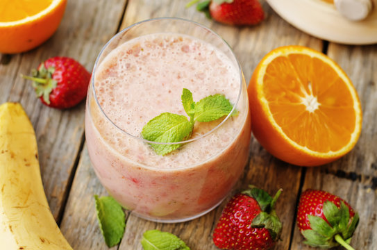 smoothie with strawberries, banana and orange