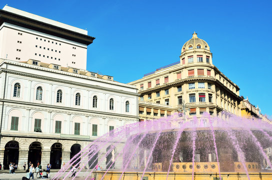 The fountain in Piazza de Ferrari (Genoa) colored purple