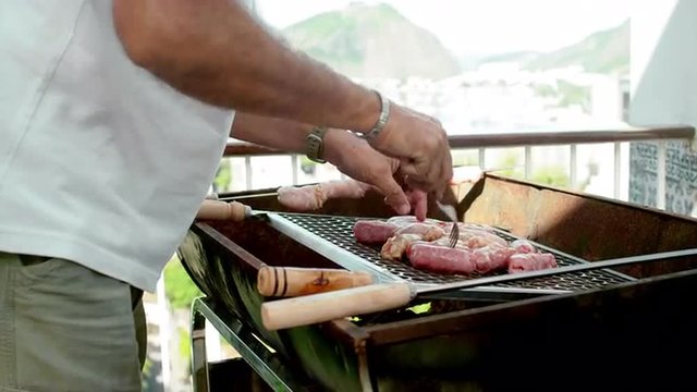 Man preparing authentic Brazilian BBQ