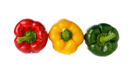 red yellow green bell pepper on white background