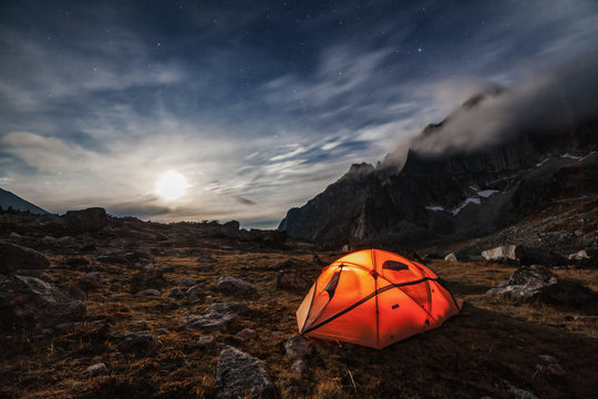 Orange Tent In The Mountains.