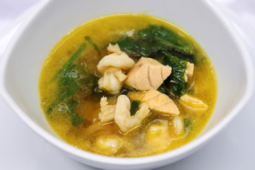 Delicious salmon soup with greens.