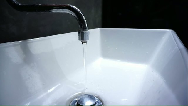Turn the water off from the tap in white wash basin