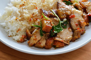 spicy stir fried crispy pork with basil leaf