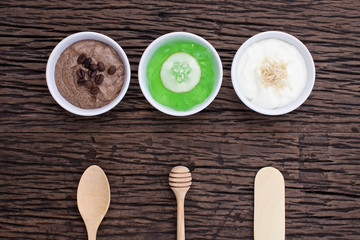 homemade body scrubs on wood background