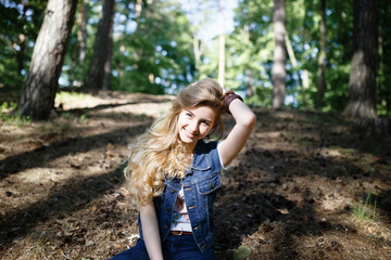 Young hipster girl in the forest hike