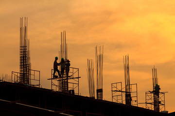 silhouette of building construction on evening