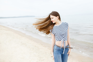 Beautiful stylish girl at sea 