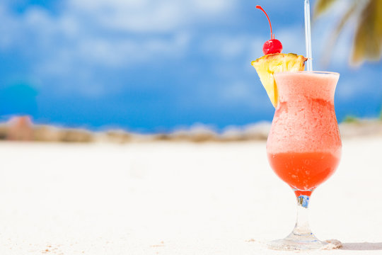 picture of fresh fruit cocktail on tropical beach