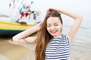 Beautiful stylish girl at sea 