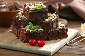 Delicious chocolate cakes on table close-up