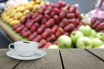 Defocus with terrace wood and cappuccino coffee in fruit market