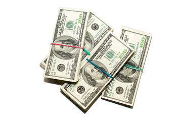 Bundles of US dollars banknotes on a white background