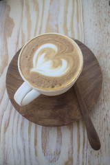 Cappuccino with heart-shaped froth decoration