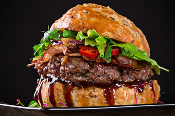delicious hamburger on dark background