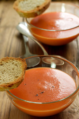 tomato soup in bowl with bread