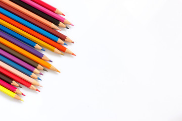 multicolored pencils growing row on white background ,Color pencils Background for business presentation