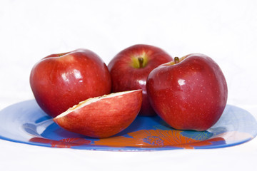 Red apples on the plate