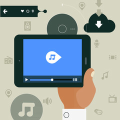 Concept of hand holding mobile device with media player app