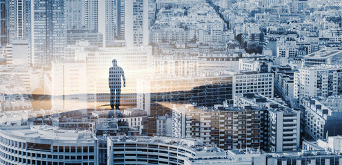 Man going in sunrise over cityscape background