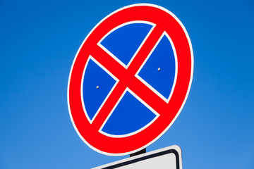 Fototapeta premium Round road sign, standing is prohibited
