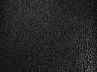 Leather texture close-up with linear stitches