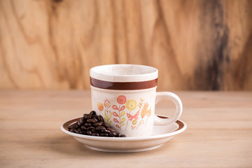 coffee cup with wooden background