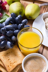 Breakfast set with fruits and orange juice