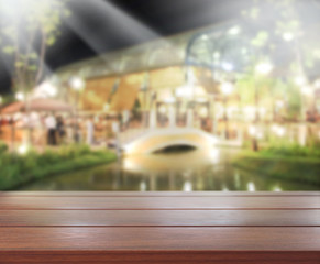 Table Top And Blur Building Background