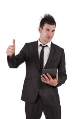 man in suit and ok symbol tablet