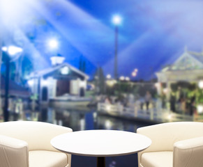 Table Top And Blur Building Background