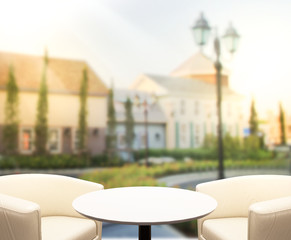 Table Top And Blur Building Background
