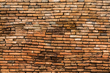 Grunge red brick wall background.