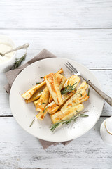 Delicious parsnips on plate