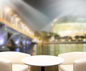 Table Top And Blur Building Background