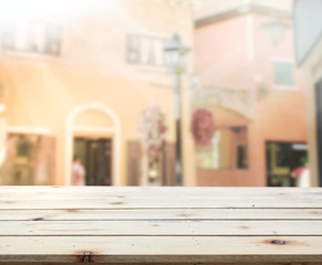 Table Top And Blur Building Background