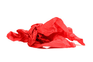 Crumpled red napkin paper isolated