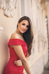 Portrait of beautiful young woman with makeup in fashion clothes