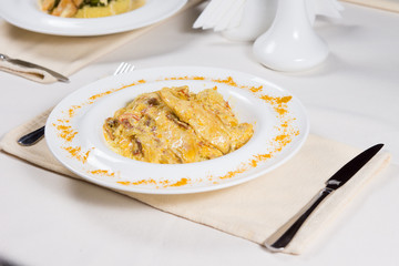 Prepared Dish at Place Setting on Restaurant Table